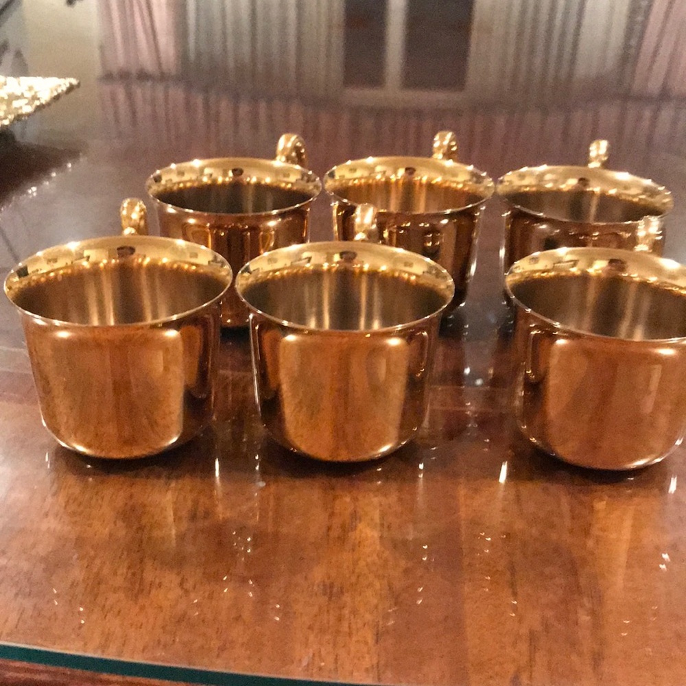 Gold color silverware tea cups